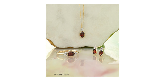 Oval Garnet & Diamond Necklace on 10k yellow Gold